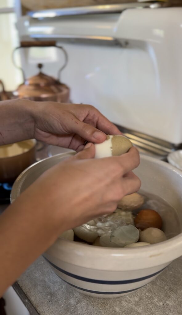 peeling eggs